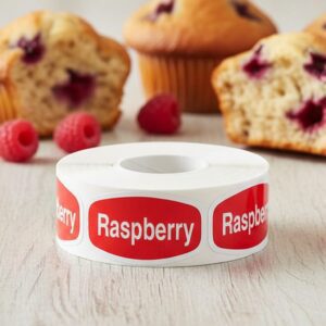 Raspberry label with red background and white print shown with raspberry pastries
