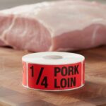 fourth pork loin on a rectangle red sticker with black print