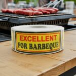 excellent for barbecue sticker on a yellow, red, and black butcher label
