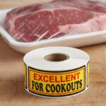 excellent for cookouts sticker on a yellow, red, and black butcher label