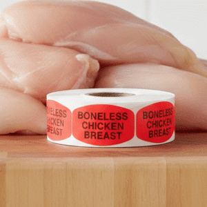 boneless chicken breast stickers on a roll of red labels with black print
