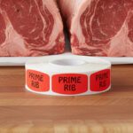 prime rib sticker on a red label with black text
