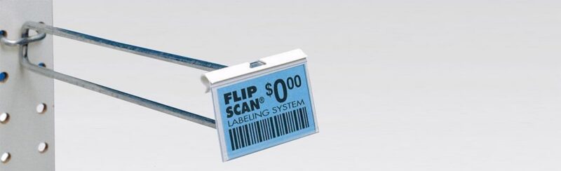 Peg hook on retail shelving with flip scan cover