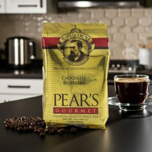 Pears Coffee Chocolate Raspberry 8oz next to coffee