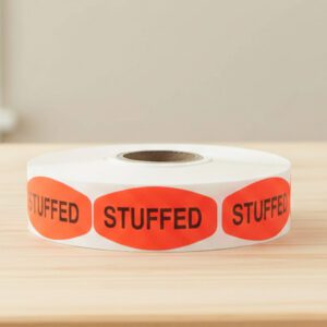 stuffed sticker on a red label with black text
