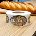 french bread sticker showing french bread in the background with the word french in white in the foreground