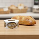 french bread label next to a loaf of french bread